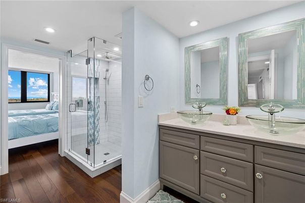 Bathroom, Bedroom, Dual Sink Vanities, Glass Shower, Interior, Recessed Lighting, Wood Texture Flooring