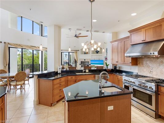 Chandelier, Dining room, Interior, Kitchen, Pendant Lights, Recessed Lighting, Stainless Steel Appliances