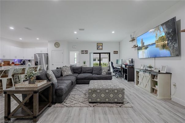 Dining room, Interior, Kitchen, Living room, Recessed Lighting, Stainless Steel Appliances, Wood Texture Flooring