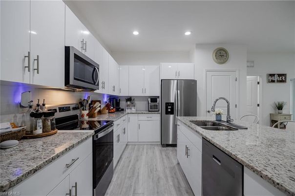 Interior, Kitchen, Recessed Lighting, Stainless Steel Appliances, Wood Texture Flooring