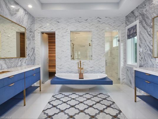 Bathroom, Dual Sink Vanities, Glass Shower, Interior, Marble Walls, Recessed Lighting