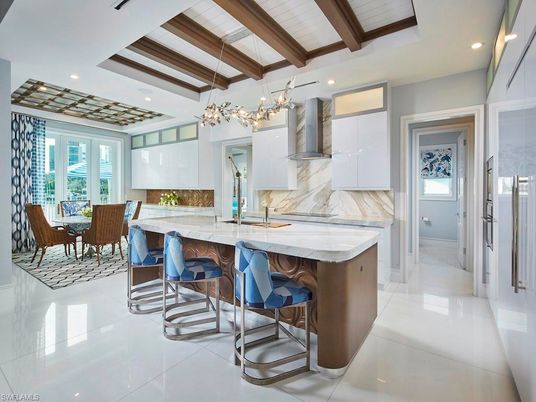 Dining room, Interior, Kitchen, Marble Walls, Pendant Lights, Recessed Lighting, Stainless Steel Appliances, Wooden Beams