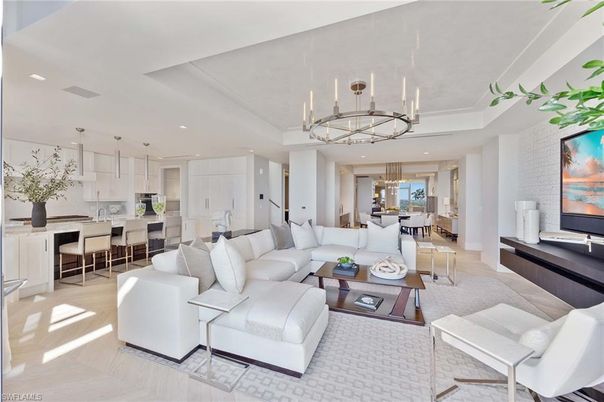 Chandelier, Dining room, Interior, Kitchen, Living room, Pendant Lights, Recessed Lighting, Stainless Steel Appliances, Wood Texture Flooring