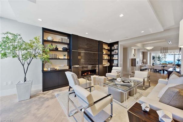 Chandelier, Dining room, Fireplace, Interior, Living room, Pendant Lights, Recessed Lighting, Wood Texture Flooring