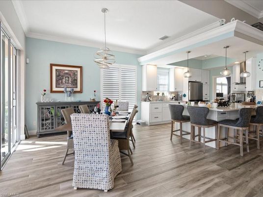 Dining room, Interior, Kitchen, Pendant Lights, Stainless Steel Appliances, Wood Texture Flooring