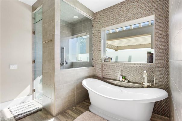 Bathroom, Free Standing Baths, Glass Shower, Interior, Wood Texture Flooring