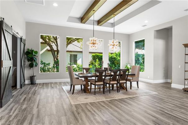 Chandelier, Dining room, Interior, Pendant Lights, Recessed Lighting, Wooden Beams, Wood Texture Flooring