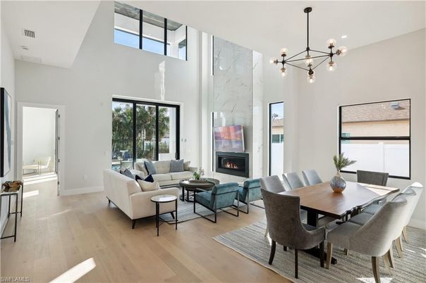 Dining room, Fireplace, Interior, Living room, Marble Walls, Pendant Lights, Wood Texture Flooring