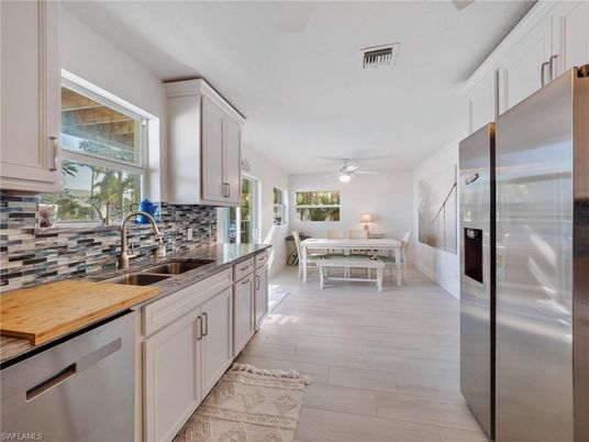 Dining room, Interior, Kitchen, Stainless Steel Appliances, Wood Texture Flooring