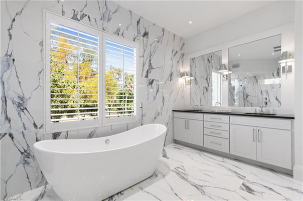 Bathroom, Dual Sink Vanities, Free Standing Baths, Interior, Marble, Marble Walls, Recessed Lighting