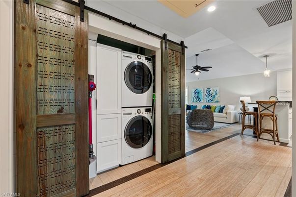 Interior, Living room, Pendant Lights, Recessed Lighting, Utility Closets, Washer, Wood Texture Flooring