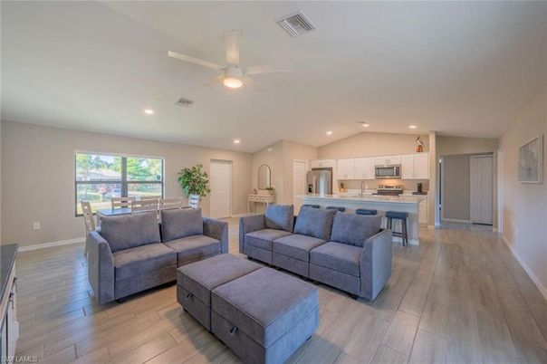 Dining room, Interior, Kitchen, Living room, Recessed Lighting, Stainless Steel Appliances, Wood Texture Flooring