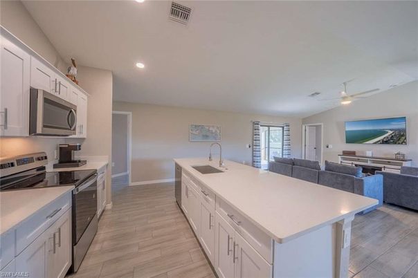 Interior, Kitchen, Living room, Recessed Lighting, Stainless Steel Appliances, Wood Texture Flooring
