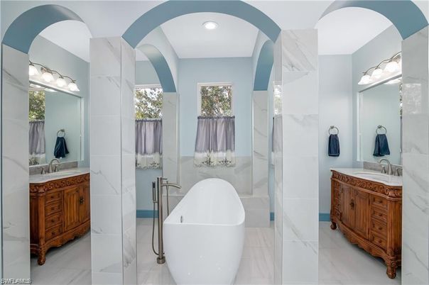 Bathroom, Dual Sink Vanities, Free Standing Baths, Glass Shower, Interior, Marble, Marble Walls, Recessed Lighting