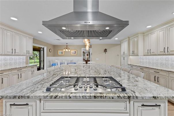 Chandelier, Dining room, Interior, Kitchen, Pendant Lights, Recessed Lighting, Stainless Steel Appliances
