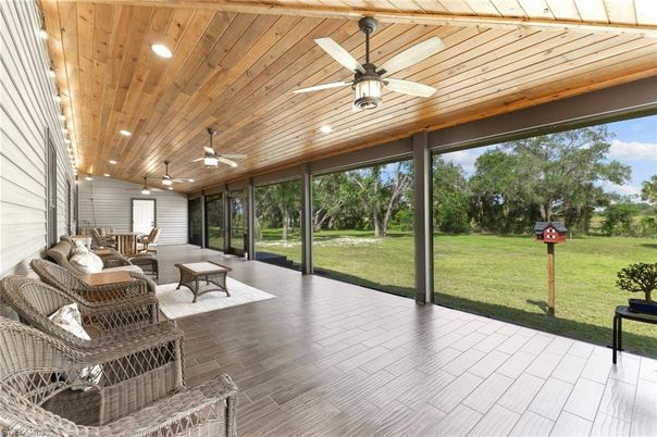 Dining room, Interior, Living room, Recessed Lighting, Sun Room, Wooden Ceilings, Wood Texture Flooring