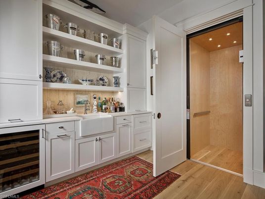 Elevator, Interior, Recessed Lighting, Wood Texture Flooring, Wooden Walls