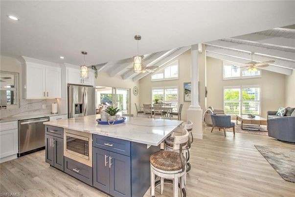 Dining room, Interior, Kitchen, Living room, Pendant Lights, Recessed Lighting, Stainless Steel Appliances, Wood Texture Flooring