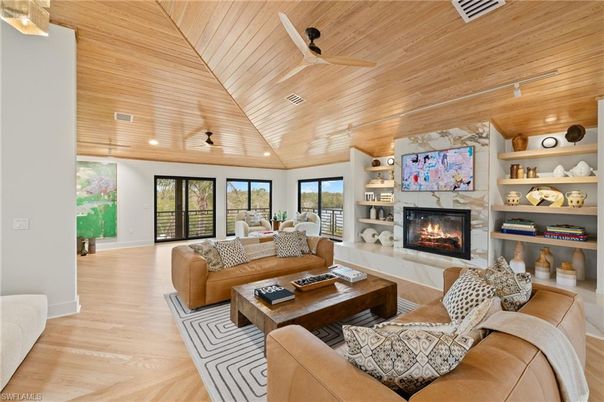 Fireplace, Interior, Living room, Recessed Lighting, Wooden Ceilings, Wood Texture Flooring