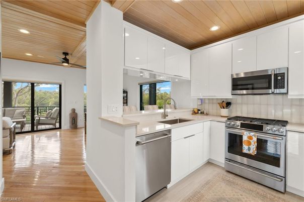 Interior, Kitchen, Living room, Recessed Lighting, Stainless Steel Appliances, Wooden Ceilings, Wood Texture Flooring