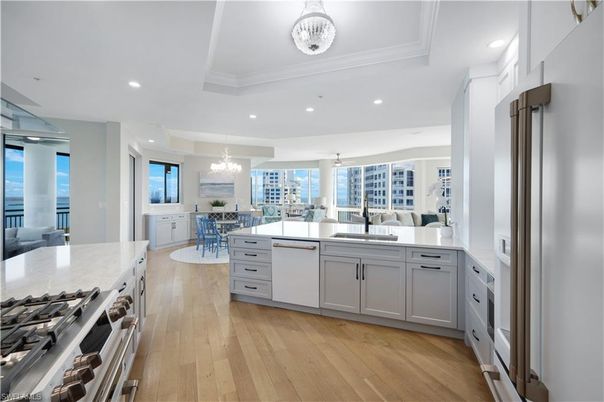 Chandelier, Dining room, Interior, Kitchen, Pendant Lights, Recessed Lighting, Stainless Steel Appliances, Wood Texture Flooring
