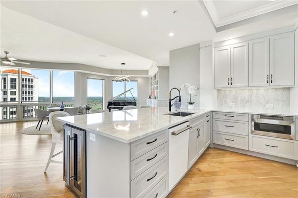 Dining room, Interior, Kitchen, Pendant Lights, Recessed Lighting, Stainless Steel Appliances, Water, Wood Texture Flooring