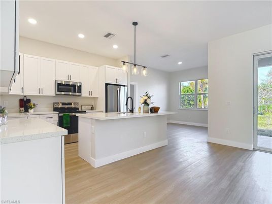 Interior, Kitchen, Pendant Lights, Recessed Lighting, Stainless Steel Appliances, Wood Texture Flooring