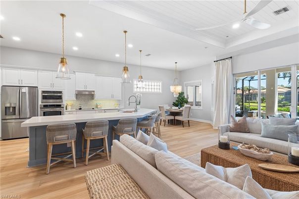 Dining room, Interior, Kitchen, Living room, Pendant Lights, Recessed Lighting, Stainless Steel Appliances, Wood Texture Flooring