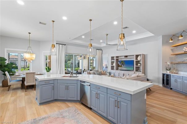 Dining room, Interior, Kitchen, Living room, Pendant Lights, Recessed Lighting, Stainless Steel Appliances, Wood Texture Flooring