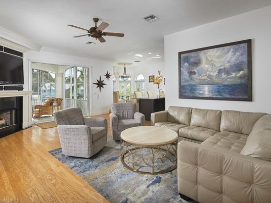 Dining room, Fireplace, Interior, Living room, Pendant Lights, Recessed Lighting, Wood Texture Flooring