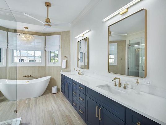Bathroom, Dual Sink Vanities, Free Standing Baths, Glass Shower, Interior, Pendant Lights, Wood Texture Flooring