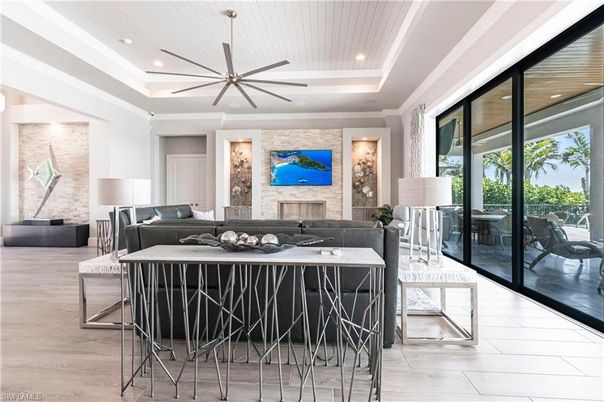 Fireplace, Interior, Kitchen, Living room, Recessed Lighting, Stone Walls, Wood Texture Flooring