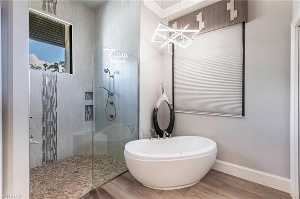 Bathroom, Free Standing Baths, Glass Shower, Interior, Pendant Lights, Wood Texture Flooring