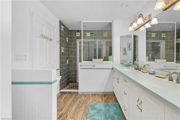Bathroom, Dual Sink Vanities, Glass Shower, Interior, Wood Texture Flooring