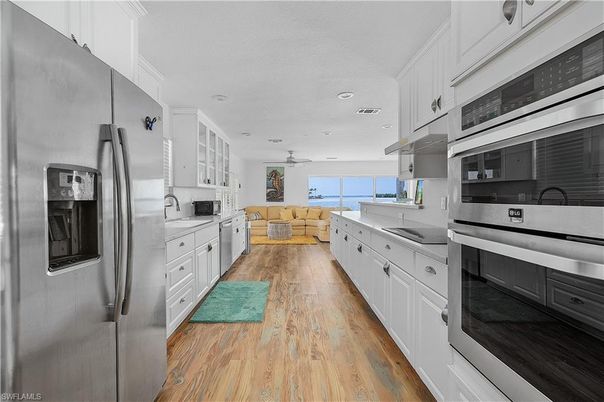 Interior, Kitchen, Living room, Recessed Lighting, Stainless Steel Appliances, Wood Texture Flooring