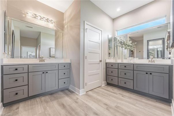 Bathroom, Dual Sink Vanities, Interior, Recessed Lighting, Wood Texture Flooring