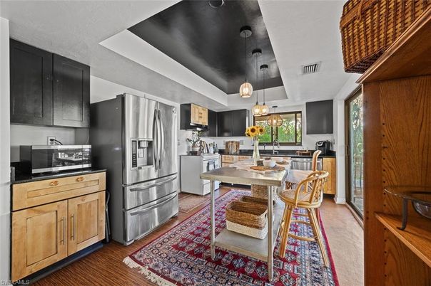 Dining room, Interior, Kitchen, Pendant Lights, Stainless Steel Appliances, Wood Texture Flooring
