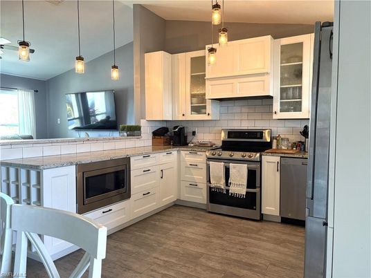 Interior, Kitchen, Pendant Lights, Stainless Steel Appliances, Wood Texture Flooring