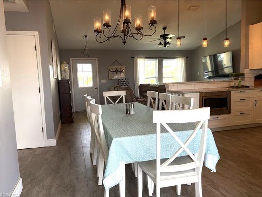Chandelier, Dining room, Interior, Pendant Lights, Wood Texture Flooring
