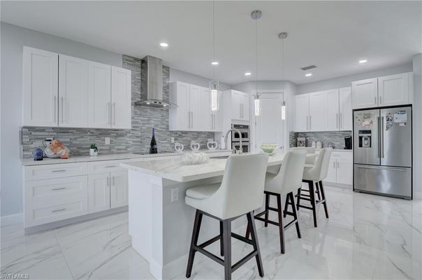 Interior, Kitchen, Marble, Pendant Lights, Recessed Lighting, Stainless Steel Appliances