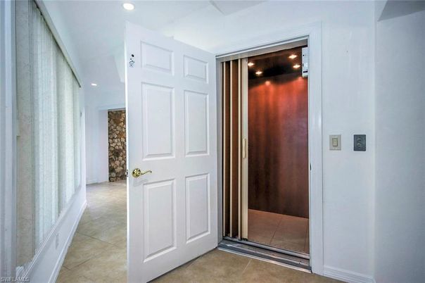 Elevator, Interior, Recessed Lighting, Wooden Walls