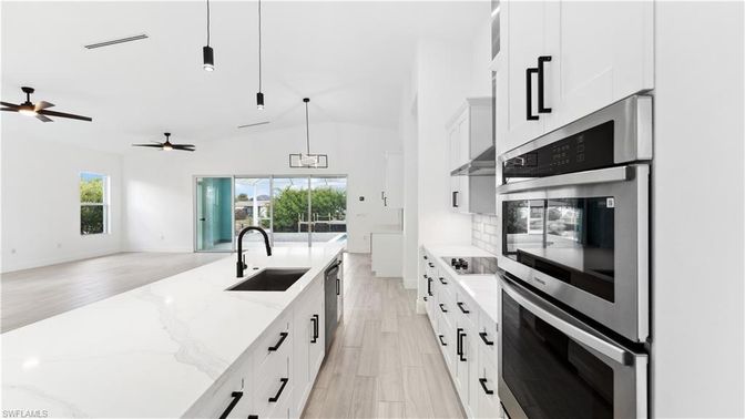 Interior, Kitchen, Pendant Lights, Stainless Steel Appliances, Wood Texture Flooring