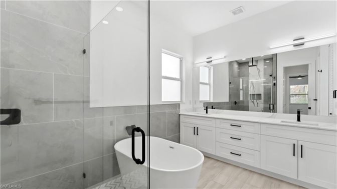 Bathroom, Dual Sink Vanities, Free Standing Baths, Glass Shower, Interior, Wood Texture Flooring