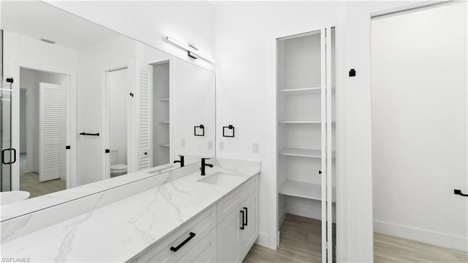 Bathroom, Dual Sink Vanities, Interior, Walk-in Closets, Wood Texture Flooring