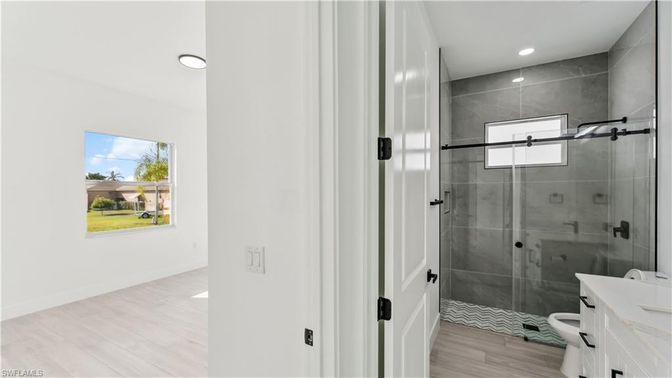 Bathroom, Glass Shower, Interior, Recessed Lighting, Wood Texture Flooring