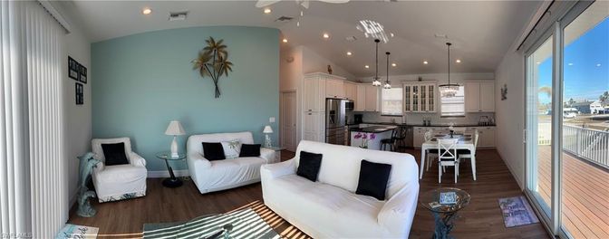Dining room, Interior, Kitchen, Living room, Pendant Lights, Recessed Lighting, Stainless Steel Appliances, Wood Texture Flooring