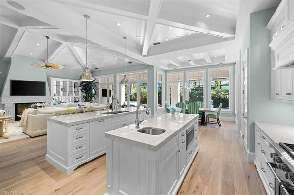 Dining room, Fireplace, Interior, Kitchen, Living room, Pendant Lights, Recessed Lighting, Stainless Steel Appliances, Wood Texture Flooring