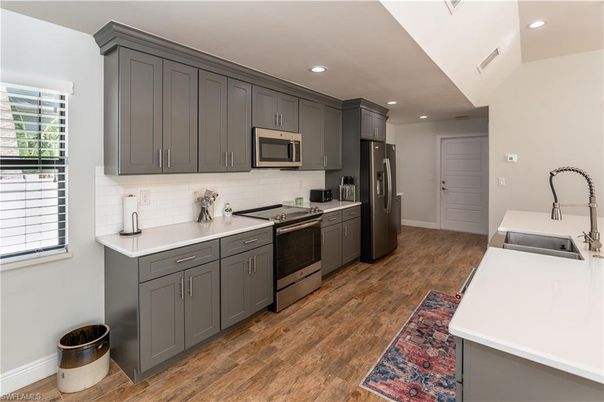 Interior, Kitchen, Recessed Lighting, Stainless Steel Appliances, Wood Texture Flooring