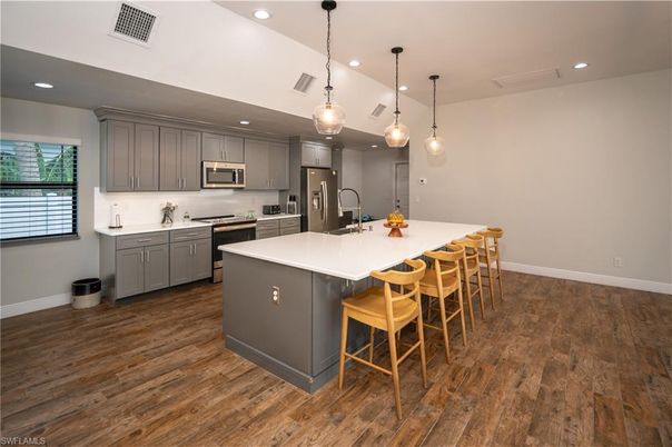 Interior, Kitchen, Pendant Lights, Recessed Lighting, Stainless Steel Appliances, Wood Texture Flooring