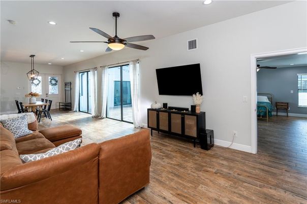 Dining room, Interior, Living room, Pendant Lights, Recessed Lighting, Wood Texture Flooring